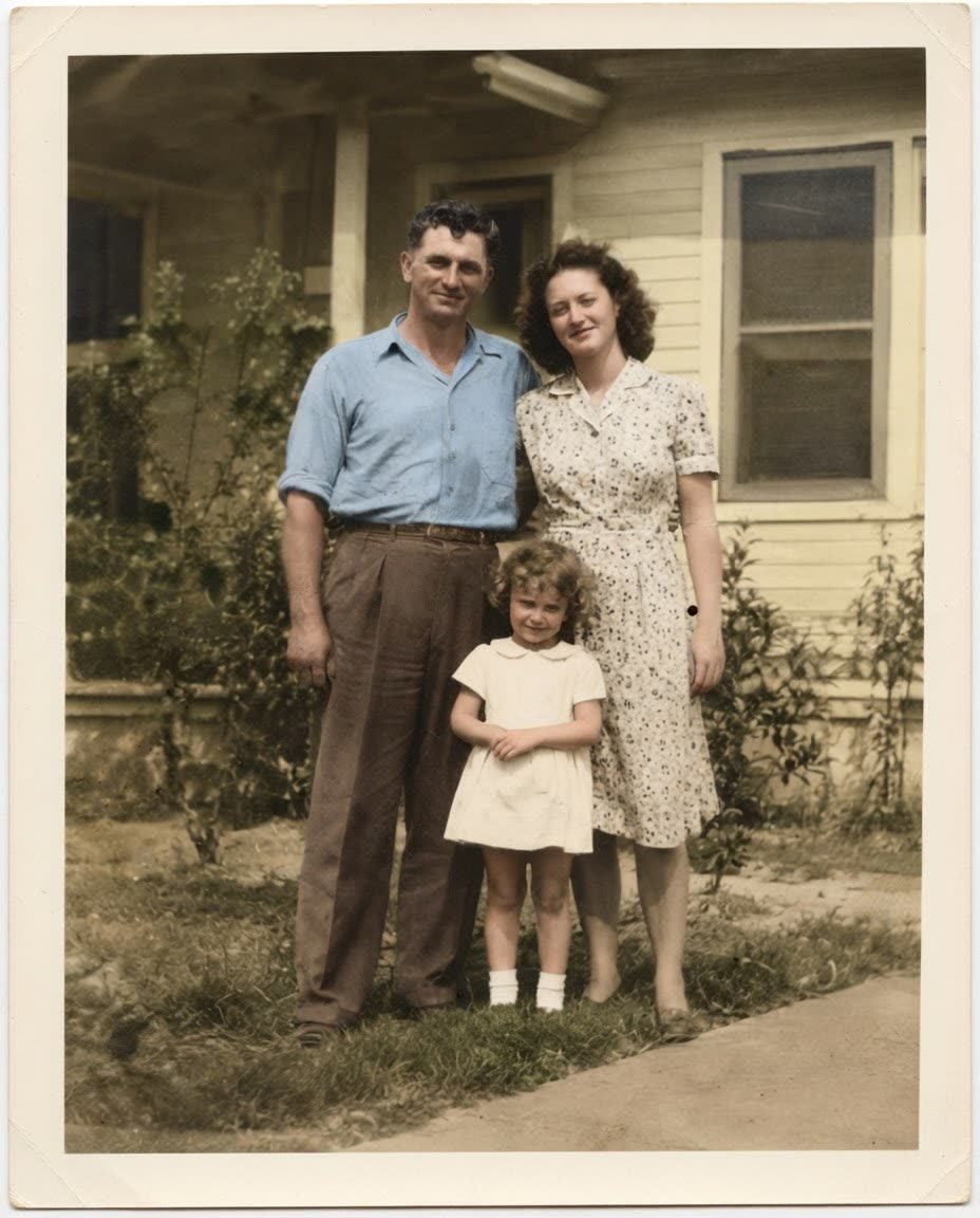 A faded, scratched black-and-white family photo — after